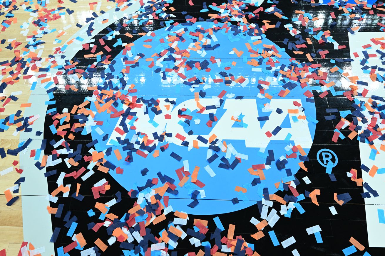 a photo of an ncaa logo covered in confetti