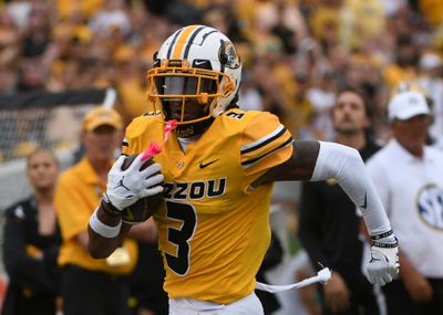 Luther burden running with the ball